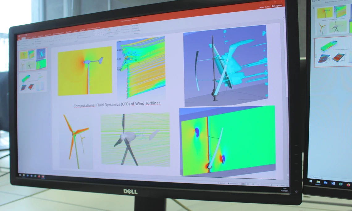 Labor_C103_Simulation_Windturbinen_THI Bildschirm mit Simulationsbildern von Windturbinen